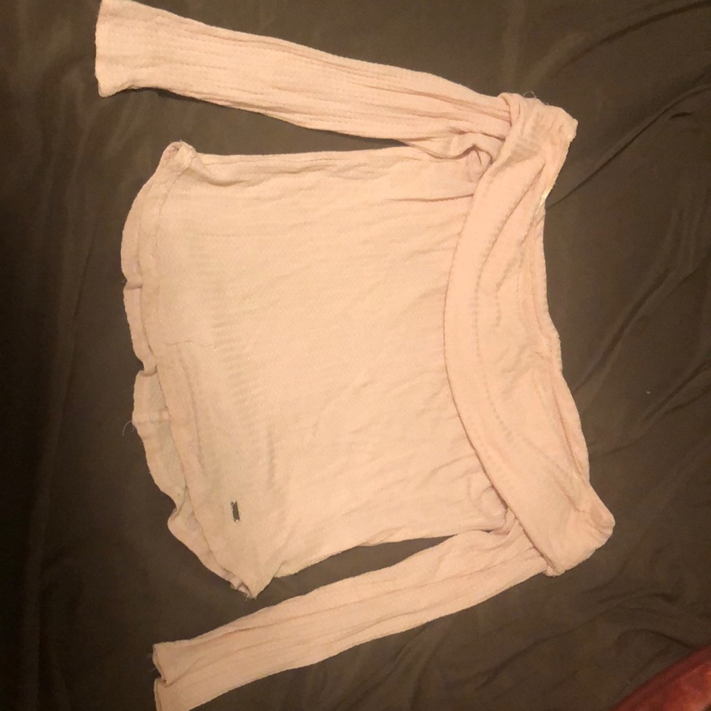 A pink off shoulder top